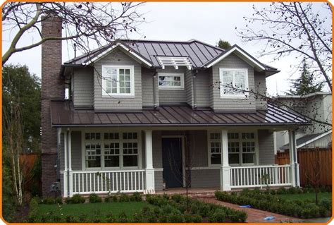 gray house brown metal roof|white barn brown roof.